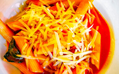 White plate of tasty pasta noodles meal dish food Mexico.