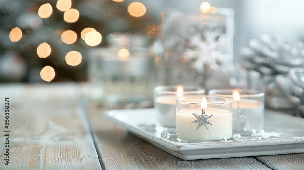 Poster a white tray with three candles on it, one of which has a star on it. the candles are lit and the tr