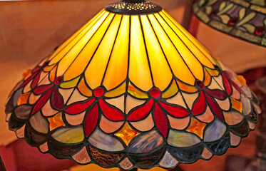 antique stained glass shade with red beads