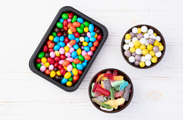 Mix of colorful candies . Multicolored unhealthy background. Sweet dessert