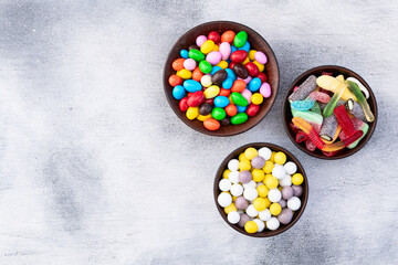 Mix of colorful candies . Multicolored unhealthy background. Sweet dessert