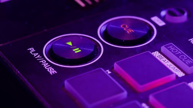 DJ playing music on festival in night club. Techno musician with headphones and sunglasses performing at nightclub for concert crowd of people, city bar.