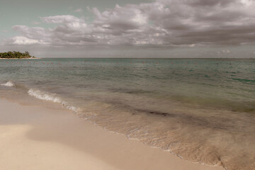 Tropical Caribbean beach clear turquoise water Playa del Carmen Mexico.