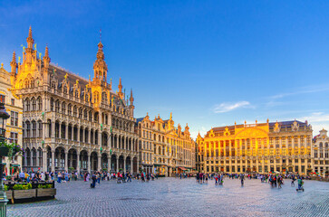 Fototapeta premium The Grand-Place Grote Markt Big Market square in Brussels city historical center with people, sunset view, King's House Brussels City Museum, House Dukes Brabant and Guilds of Brussels, Belgium
