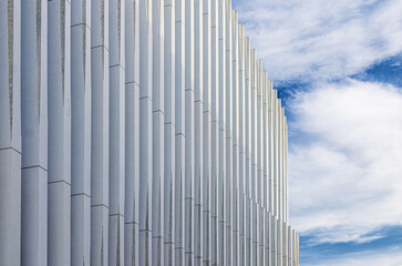 Patterned vertical stripes, columns structure of modern design building wall abstract details with...