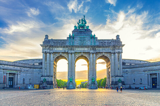 Cinquantenaire Arcade Neoclassical style on sunset in Park of the Fiftieth Anniversary Parc du Cinquantenaire Jubelpark Park in European Quarter of Brussels city, Brussels-Capital Region, Belgium