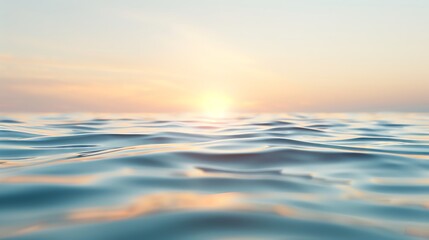 Fototapeta premium Calm ocean waves with a golden sunrise in the distance.