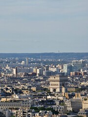 Paris, France - April 12, 2024: Aerial view of crowded Paris skyline with Seine River, Ile de France, France. Panorama view from Eiffel tower to the city skylines.