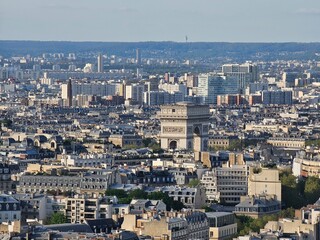 Paris, France - April 12, 2024: Aerial view of crowded Paris skyline with Seine River, Ile de France, France. Panorama view from Eiffel tower to the city skylines.