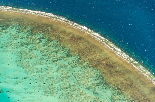 Spectacular aerial view on Great Barrier Reef on the way from Cairns to Lizard Island, Queensland, Australia. Great Barrier Reef&not;&dagger;is the worlds largest coral reef system.