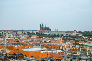 Fototapeta premium Prague, Czech Republic - City buildings and astronomical clock in Prague Square