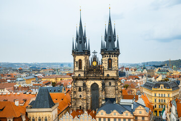 Fototapeta premium Prague, Czech Republic - City buildings and astronomical clock in Prague Square