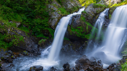 Fototapeta premium Multiple metaphysical natural deep green forest waterfalls landscape