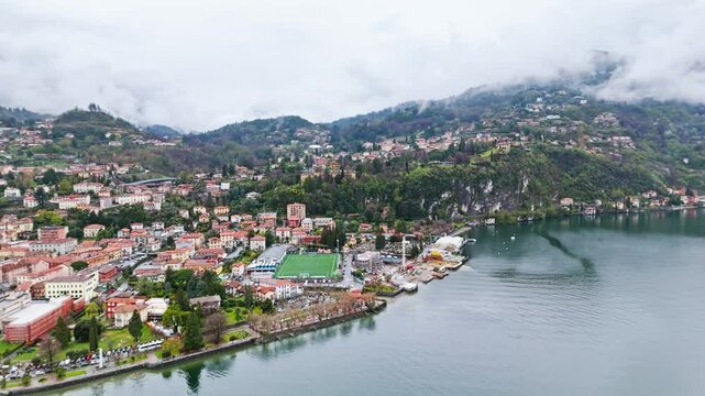 Menaggio historic cultural town on Lake Como, from above on a cloudy day. Aerial drone footage