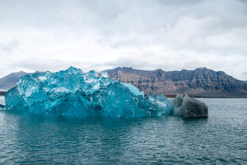 Stranded Iceberg broken off from glacier field floating around in Jokulsarlon in Iceland