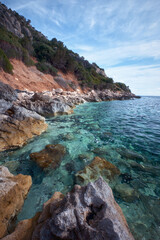 Summer rocky coastline of Golfo di Orosei and Cala Gonone on the west coast of Sardinia. Italy
