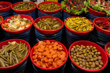 Different fruit and vegetable pickles at a farmers' market in Turkey.