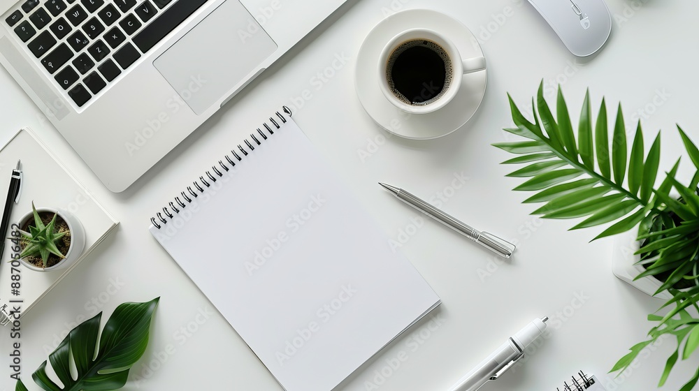 Wall mural office desk with a white table featuring a blank notebook computer supplies and a coffee cup top vie