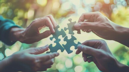 Teamwork of business people working together and combining pieces of a puzzle. Teamwork to achieve success concept. Working together 