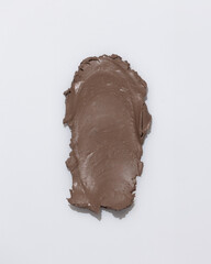 An elegant sample of a cosmetic swatch showcasing a rich shade and silky texture. Perfect for use in advertising campaigns, product catalogs, and sales presentations.