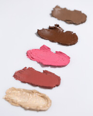 An elegant sample of a cosmetic swatch showcasing a rich shade and silky texture. Perfect for use in advertising campaigns, product catalogs, and sales presentations.