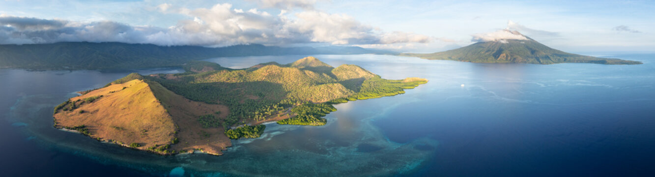 Daybreak illuminates the scenic island of Pulau Lembata, between Alor and Flores, Indonesia. This beautiful and biodiverse area is part of the famed Ring of Fire and is volcanically active.