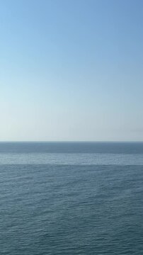 Blue sea and sky, vertical video