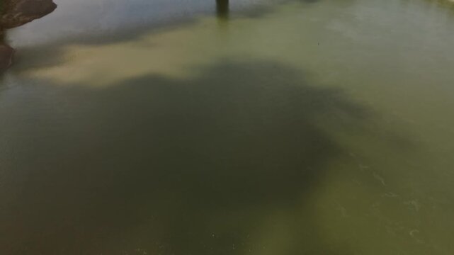 Aerial Drone Sherman Minton Bridge Ohio River Wide Tilt up from Water and Push In