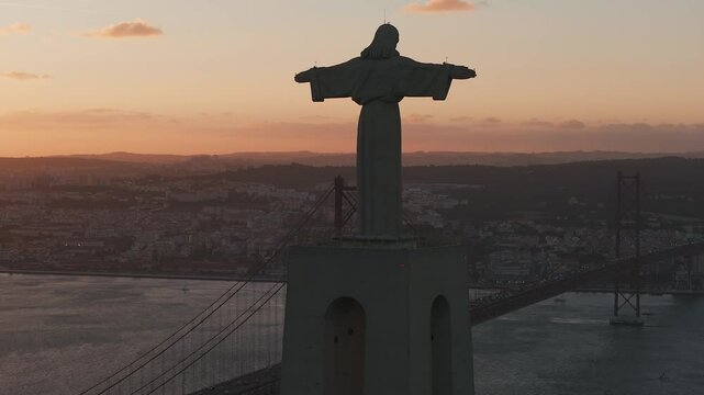Aerial view of Sanctuary of Christ the King or Santuario de Cristo Rei on sunny summer day at sunset. Mighty catholic monument.