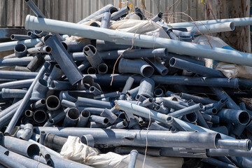 Scrap plastic pipes waiting for recycling