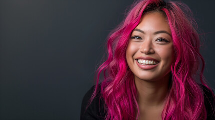 Professional portrait of a mixed race lesbian with bright pink hair, her joyful expression capturing her vibrant personality.