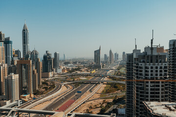 Stunning aerial view of urban skyline with skyscrapers and highway 