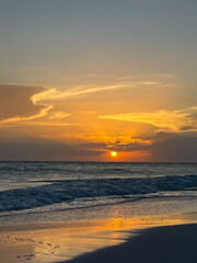 Ocean sunset on the beach in Florida with colorful skies.