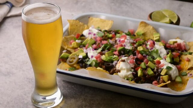 american style football day nacho with beer