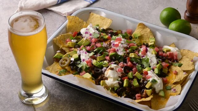 american style football day nacho with beer