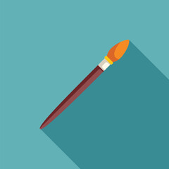 Paintbrush is lying diagonally on a blue surface, casting a long shadow