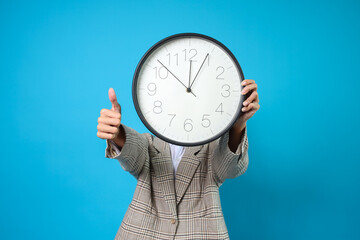 Clock Face Businesswoman Giving Thumb Up Isolated On Blue Background