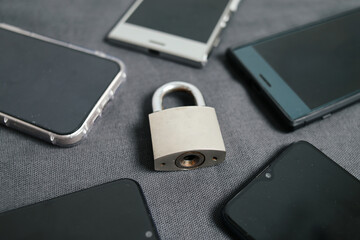 Cyber ​​Security Concept. Smartphone With Padlock In Circle Over Gray Background