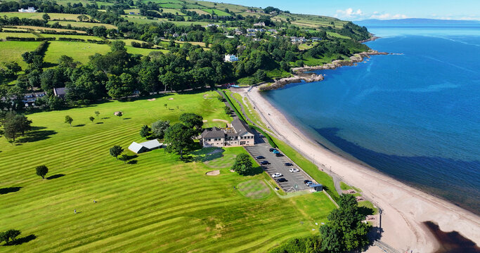 Aerial View of Cushendall Golf Club Course on the Irish Sea Antrim Northern Ireland on a sunny day with a blue sky 10-07-24
