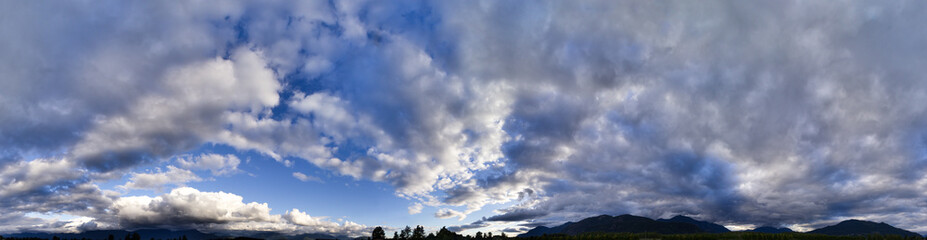 Cloudy Cloudscape over Canadian Nature Landscape.