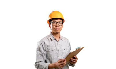 Portrait of a smiling Asian construction worker wearing helmet and holding a clipboard, isolated on transparent background