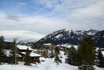 Ski Resort Town with Snow-Covered Slopes and Mountain Lodges