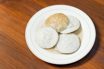 serabi or surabi is made from rice flour with salty toppings such as mayonnaise