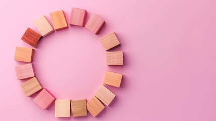 Pink background with wooden blocks presenting a circular graph for market share distribution in business analysis. Flat lay, high quality, no realistic photo details