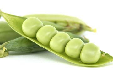 Fresh green peas in a pod on a white background
