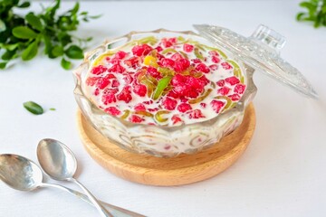 Lodchong Singapore with thai red rubies in coconut milk or water chestnuts in coconut soup , thai dessert, cendol, on white background