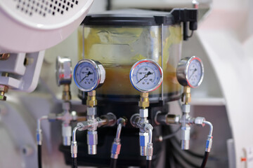 part of industrial equipment with pressure gauges