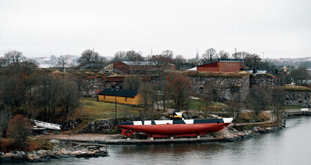 View of red boat lying in Fortress of Suomenlinna in Helsinki, Finland