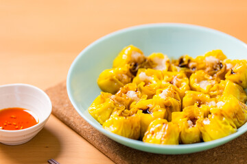 Hong Kong famous street food siu mai fish dumpling with spicy oil