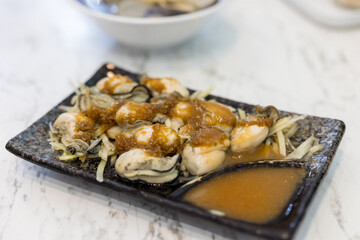 Cooked oyster with garlic sauce